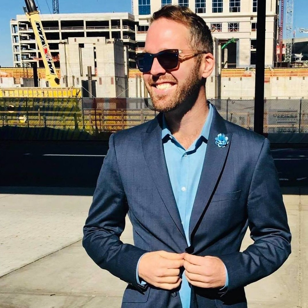Jay Stratton, Fenix Financing founder, wearing a blue suit